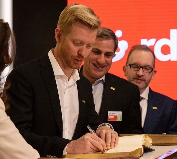 Futures Tick up After Wall Street Hits Record Highs