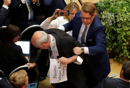 Apparent Protester Removed Ahead of Trump-Putin Conference