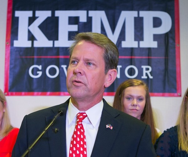 brian kemp speaks during a campaign rally