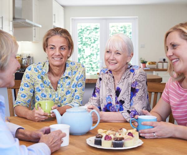 a group of friends holding a small gathering at a home