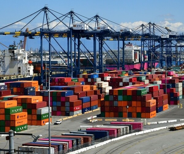 shipping containers sit on the port of los angeles