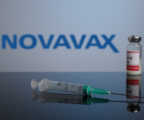 Novavax logo and syringe and COVID vaccine vial