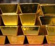 Gold Gains 1% on Safe-Haven Demand, Softer Dollar