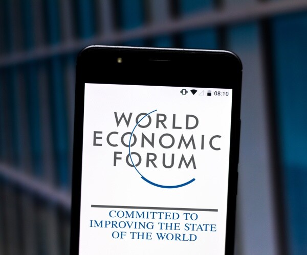wef website is pulled up with logo on a smartphone