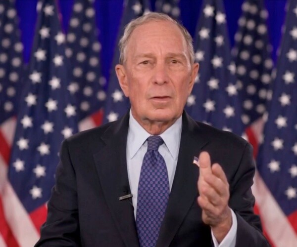 michael bloomberg gestures while speaking