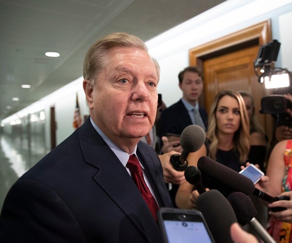 lindsey graham talks to reporters