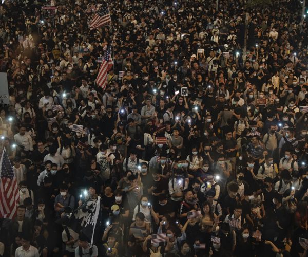 Tens of Thousands of Hong Kong Protesters Plead for US Help