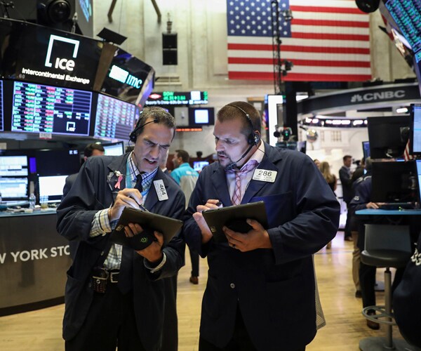 Traders on the floor of the New York Stock Exchange