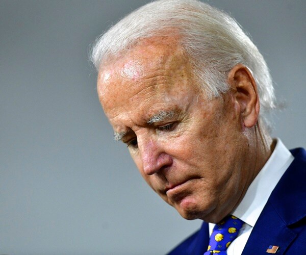 joe biden looks down during a speech
