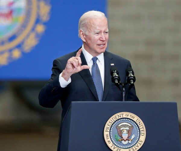 joe biden gestures while speaking