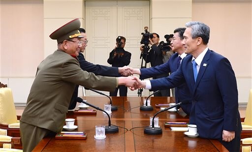 Rival Koreas Restart Talks, Pull Back from Brink  for Now