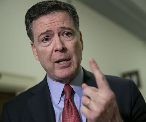 former fbi director james comey speaks to reporters in washington