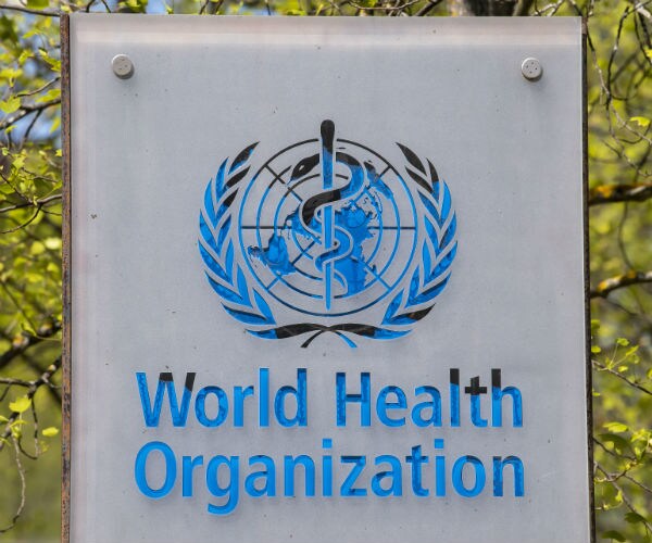 world health organization logo is shown on a sign