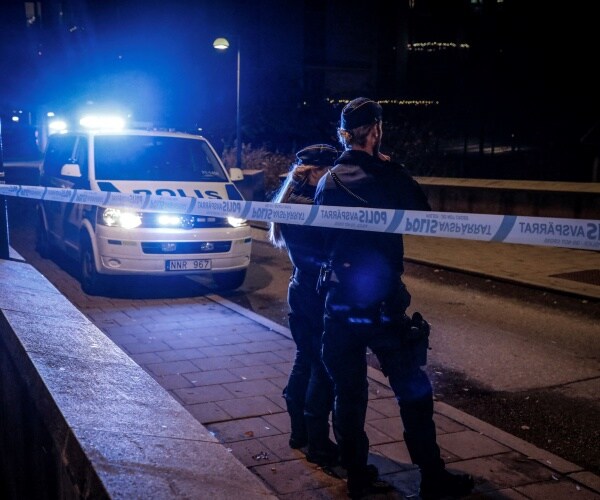 Police forensics working on a site 