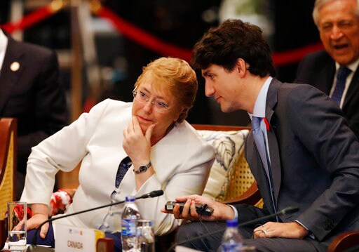 The Latest: Japan's Abe Says Canada Differs on TPP 11 Deal