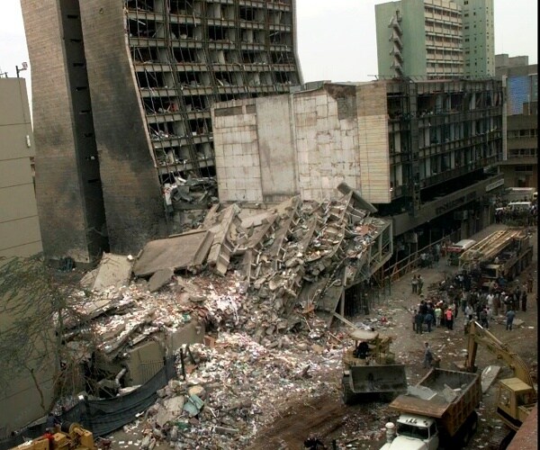 us embassy and damaged building after bombing