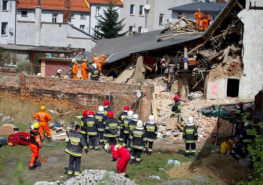 Polish PM Vows Aid to Survivors of Apartment Collapse