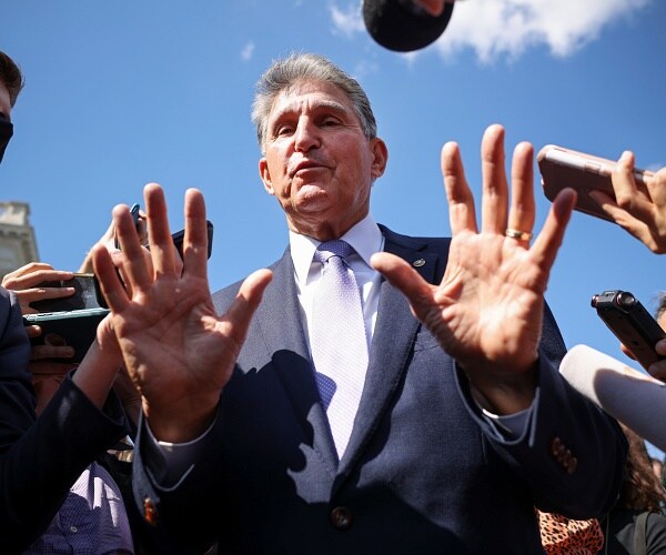 joe manchin speaks to press outside
