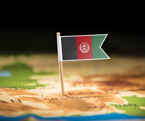 afghanistan marked with a flag on the map