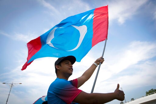 Flag-waving Malaysians Cheer Opposition Election Victory