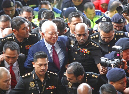 The Latest: Ex Malaysia PM Charged with 3 Criminal Counts