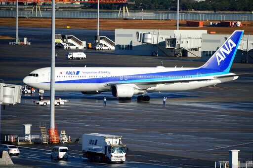 Japanese Evacuation Flight Brings Back Workers from Wuhan