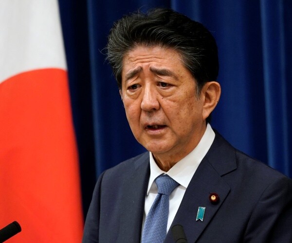 shinzo abe speaks at a press conference