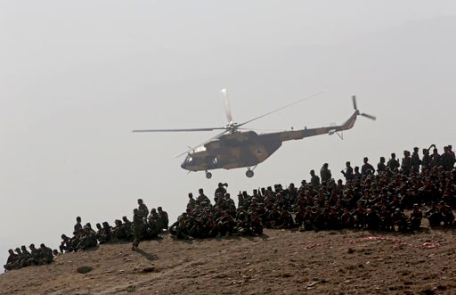 The Latest: Afghanistan: Taliban Kill 71 People in Attacks