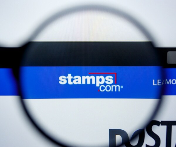 stamps dot com website under magnifying glass