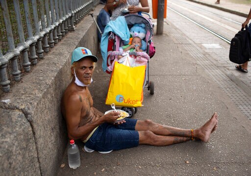 Brazil's Bolsonaro Ignores Calls for Lockdown to Slow Virus