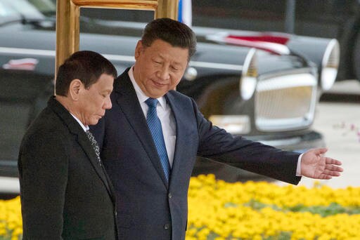 The Latest: China, Philippines Resume Talk on Sea Disputes
