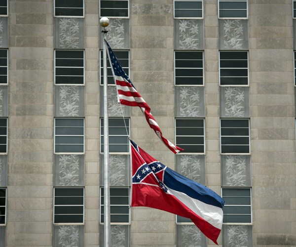 a confederate flag and an american flag