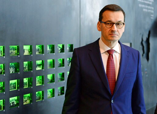 The Latest: Poland Reverses Course on Disputed Holocaust Law