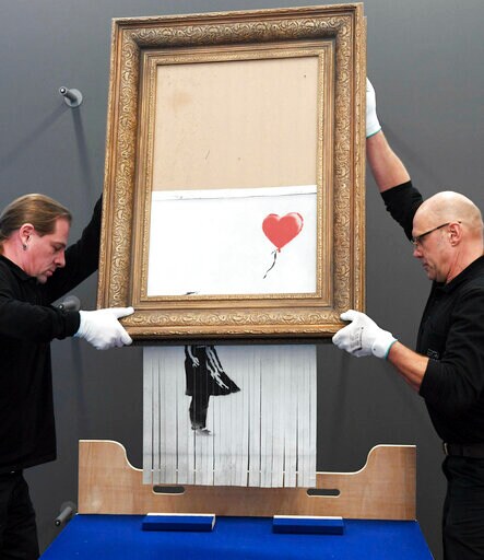 Banksy Painting That Self-destructed Displayed in Germany