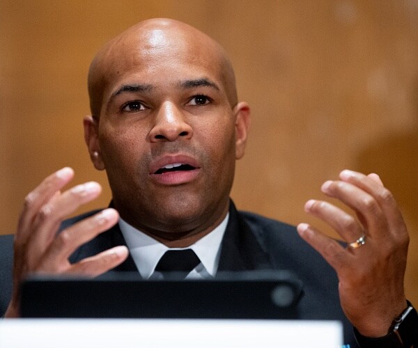 jerome adams speaks in front of committee