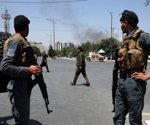 Gun Battle Rages in Afghan Capital after Taliban Blast Injures 100