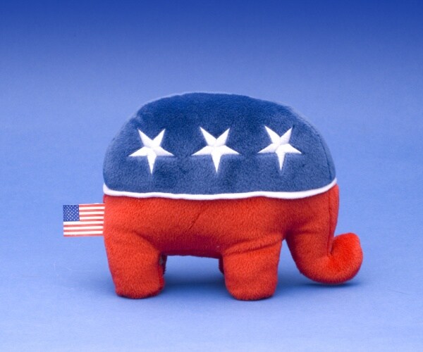 stuffed toy Republican party mascot elephant on blue background