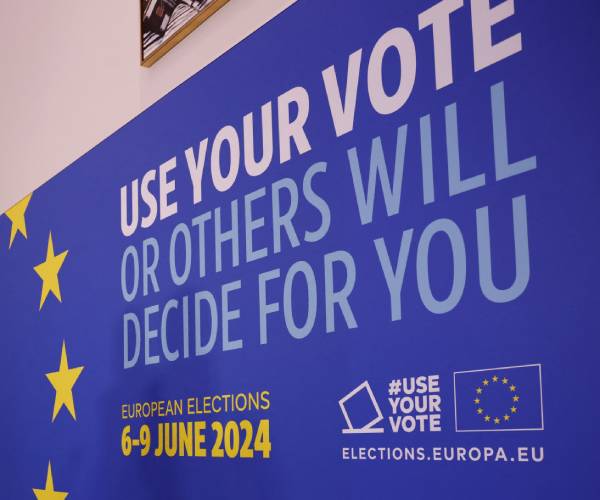 a sign urging europeans to vote in the eu parliamentary elections