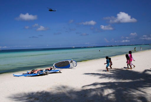 Tourists Enjoy Final Day at Beach before Boracay Closure