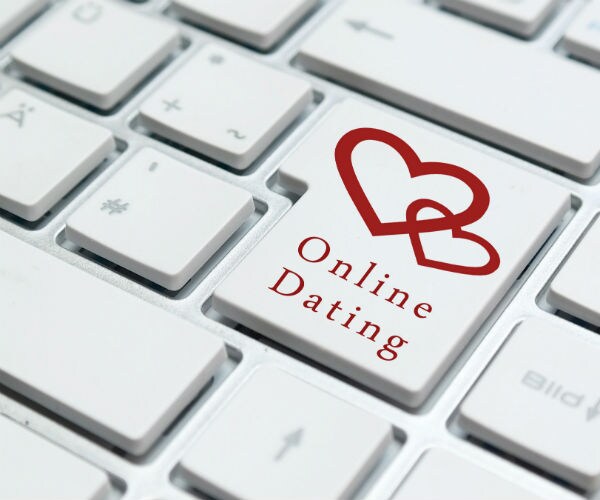 white keyboard with dating button online dating  