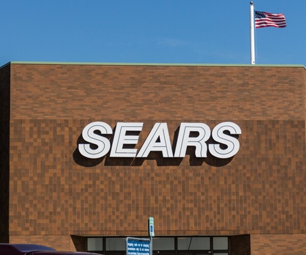 sears  corporate logo symbol emblem on
