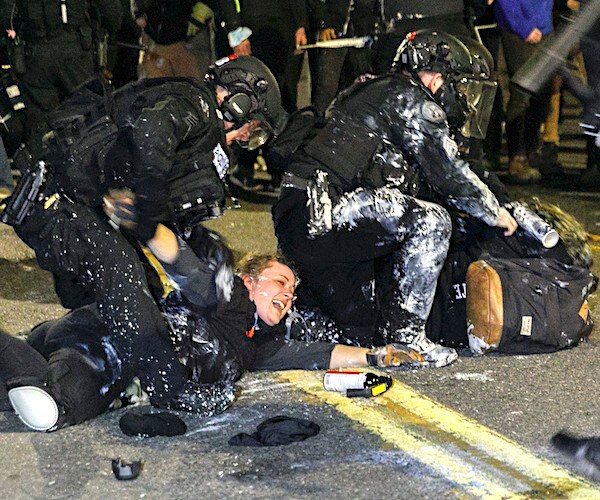 portland police apprehend violent rioters on the road way