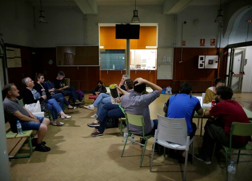 The Latest: Spain Has Catalan Voting Technology Dismantled