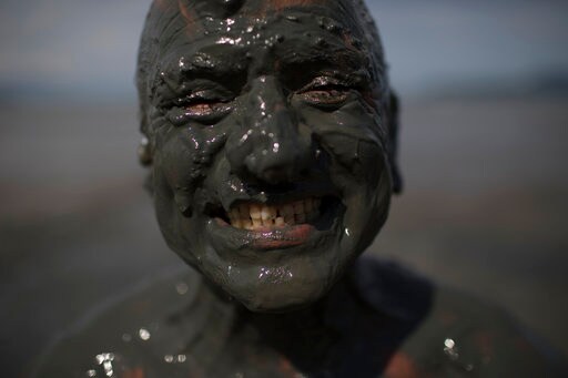 Flying Sludge, Dirty Kisses at Brazil Carnival 'mud Party'