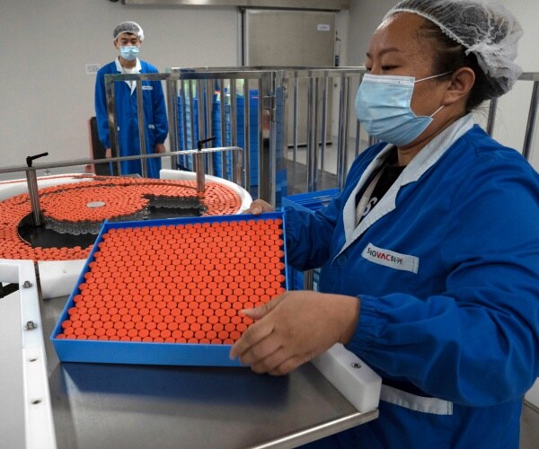 China Joins WHO-backed Vaccine Program COVAX Rejected by Trump