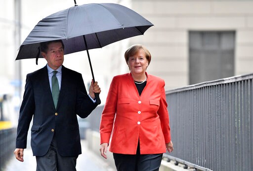The Latest: Angela Merkel Votes in Germany, Seeks 4th Term