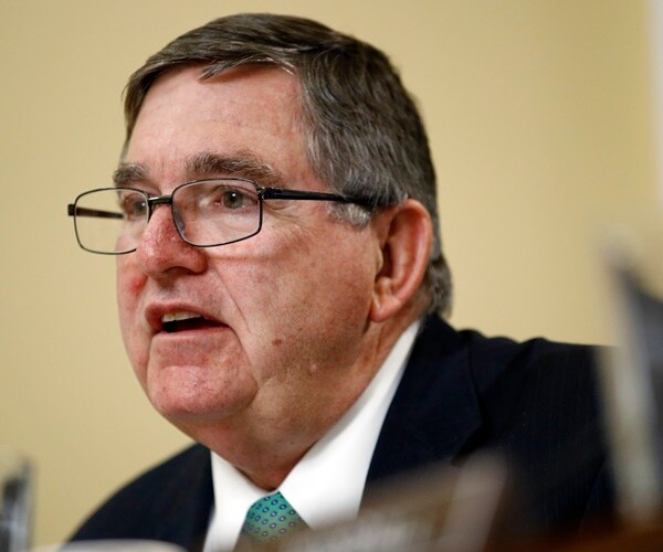 rep. mike burgess speaks at a house committee