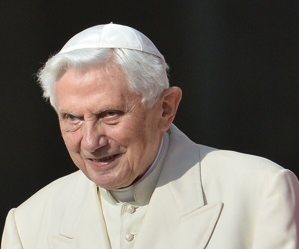 pope benedict stands outside