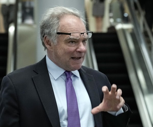 sen. tim kaine of virginia speaks to reporters