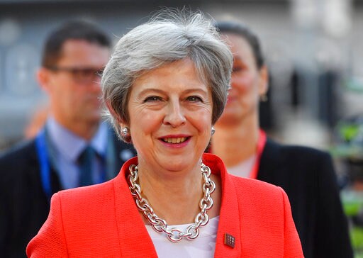 The Latest: Pound Falls after May Says Brexit at 'impasse'